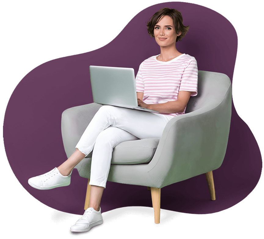 Green abstract background shape behind a woman sitting with a laptop